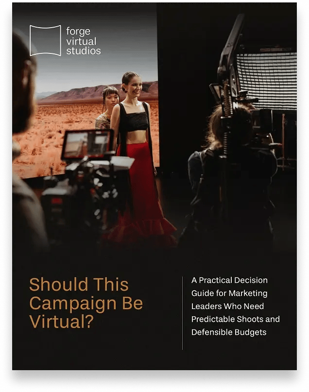 Film crew shooting models on a virtual stage with desert backdrop for a campaign guide
