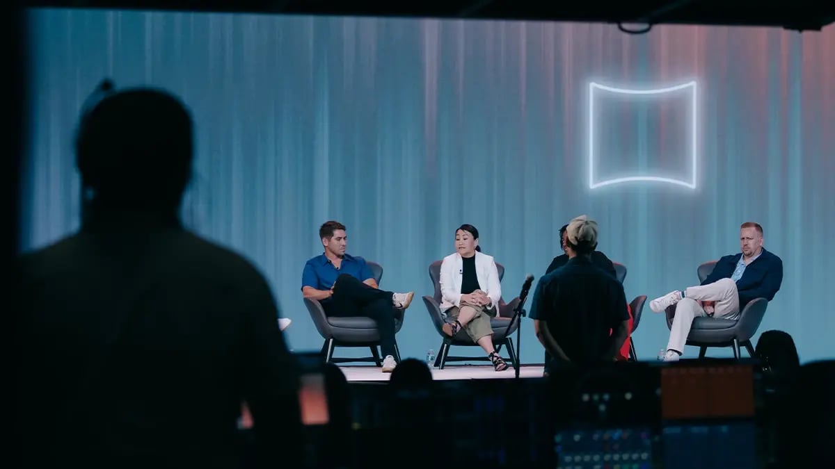 A broadcast operator works in the tech both for a recorded multi-camera live panel discussion