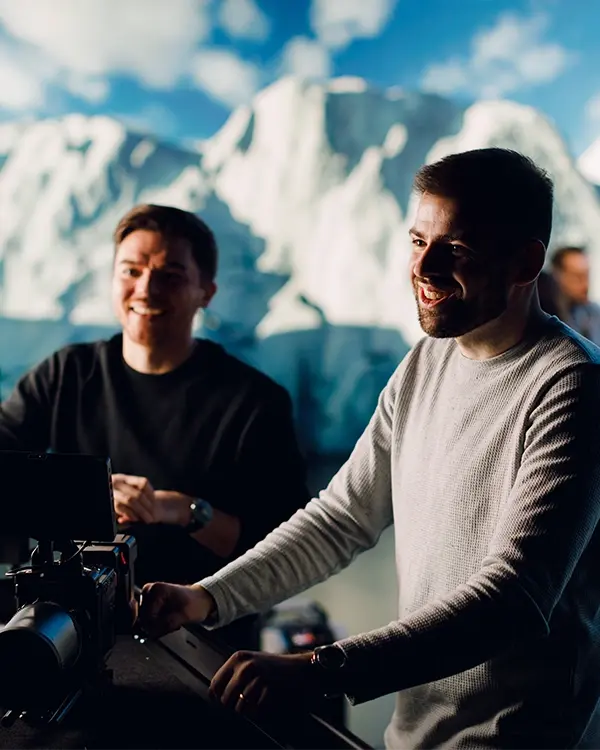 A producer and director enjoying their time on set.