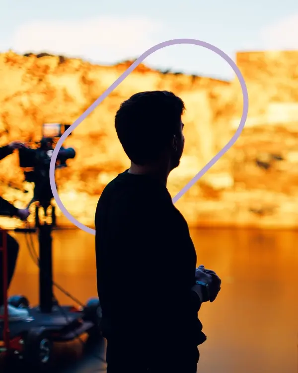 A producer overseeing a virtual production set