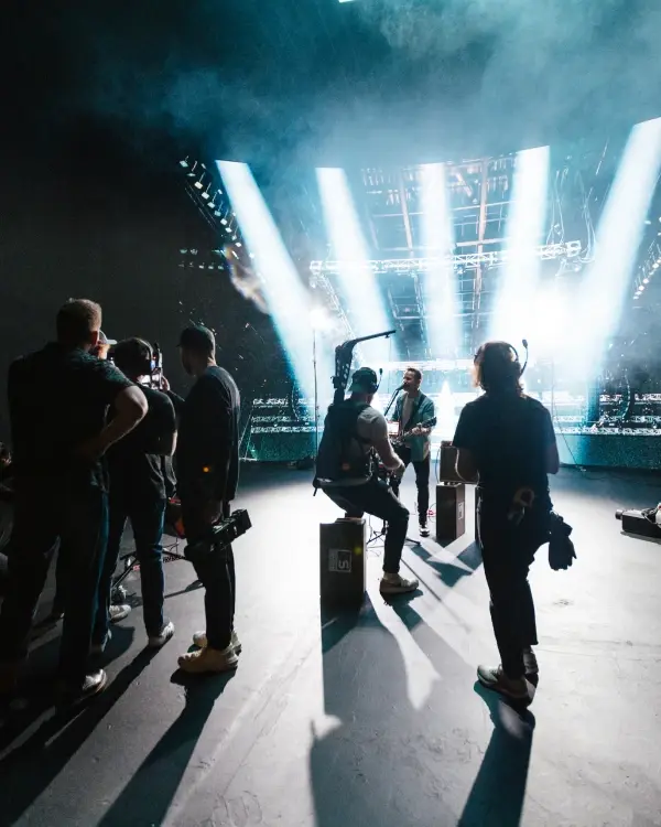 A musician performing in a music video filmed in virtual production