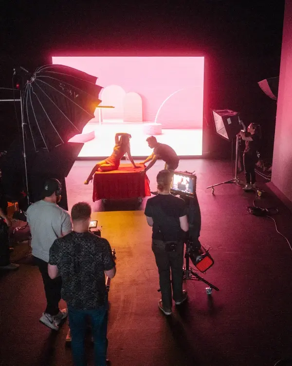 A musician performing in a music video filmed using virtual production techniques